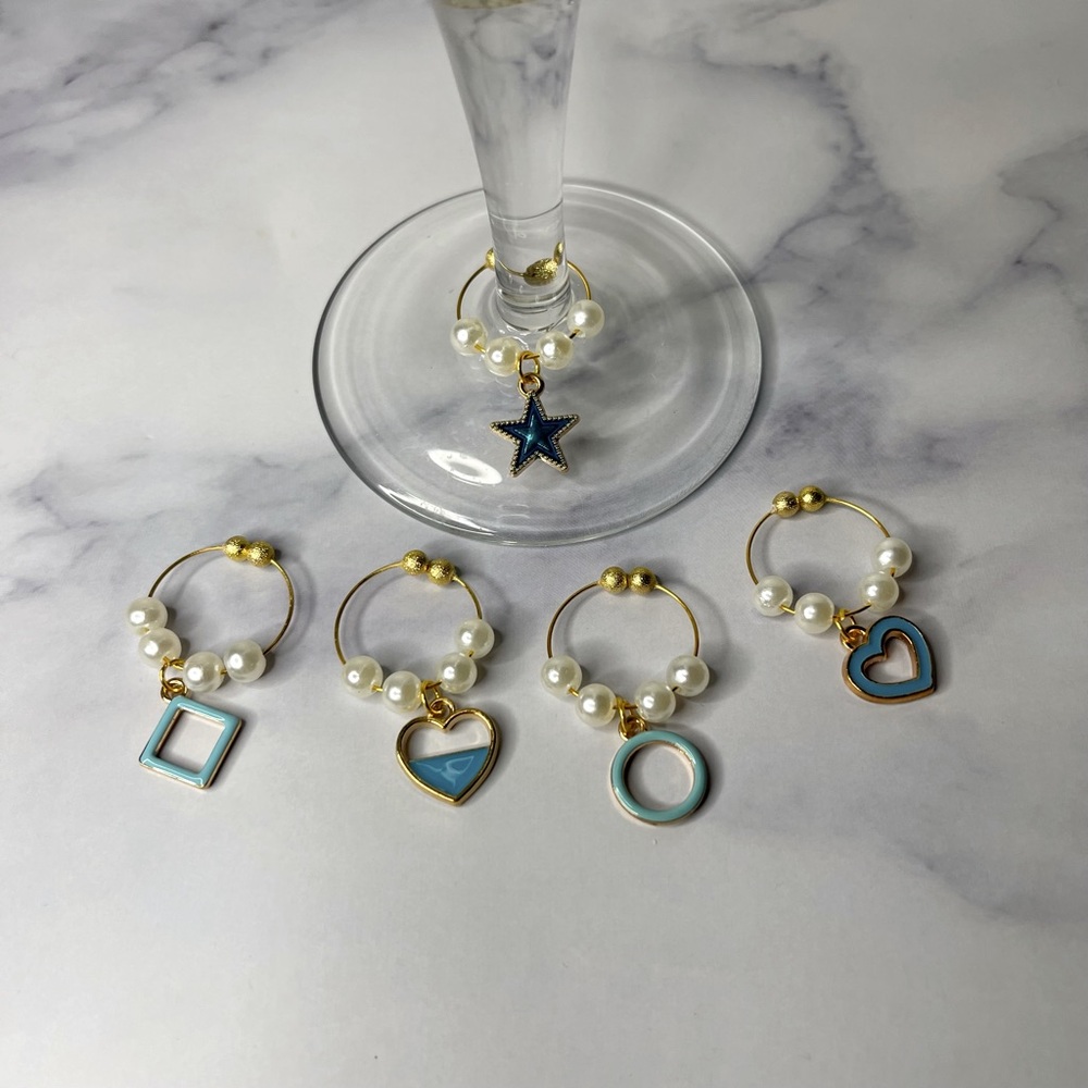 2/$10 ❤️❤️Blue & gold wine charms